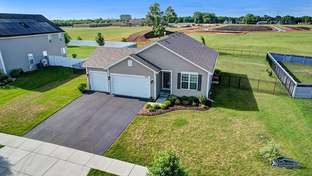 2215 Truman Trl, Mchenry, IL 60051 - view of front of property with a garage, driveway, and a fenced backyard