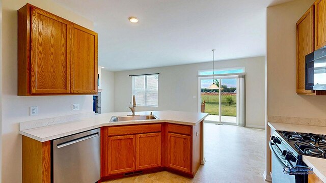 2215 Truman Trl, Mchenry, IL 60051 - kitchen with dishwasher, a peninsula, black microwave, brown cabinets, and recessed lighting