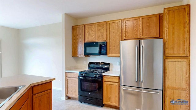 2215 Truman Trl, Mchenry, IL 60051 - kitchen featuring black appliances, light countertops, and brown cabinets