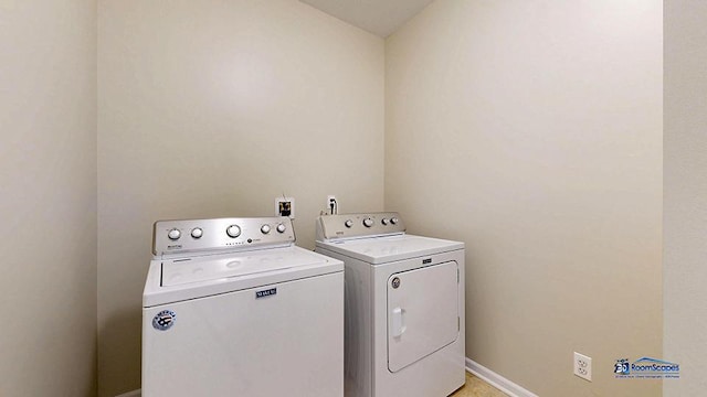 2215 Truman Trl, Mchenry, IL 60051 - laundry area with washing machine and clothes dryer and baseboards