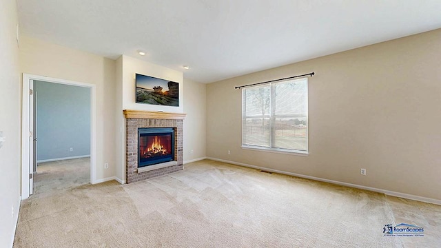 2215 Truman Trl, Mchenry, IL 60051 - unfurnished living room with carpet floors, a brick fireplace, and recessed lighting
