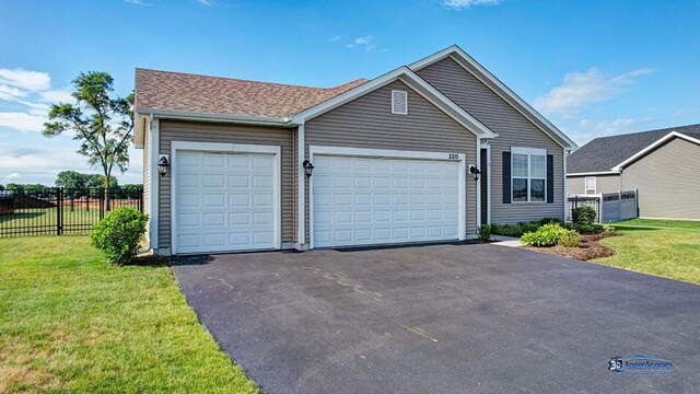 2215 Truman Trl, Mchenry, IL 60051 - ranch-style home with driveway, a garage, and a shingled roof