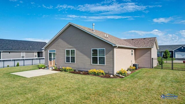 2215 Truman Trl, Mchenry, IL 60051 - back of property with a patio area, a fenced backyard, and roof with shingles