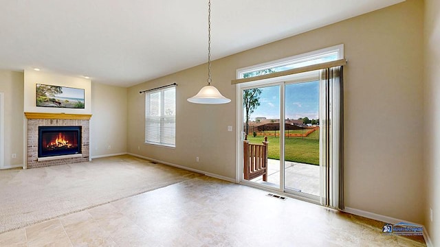 2215 Truman Trl, Mchenry, IL 60051 - unfurnished dining area featuring baseboards and a brick fireplace