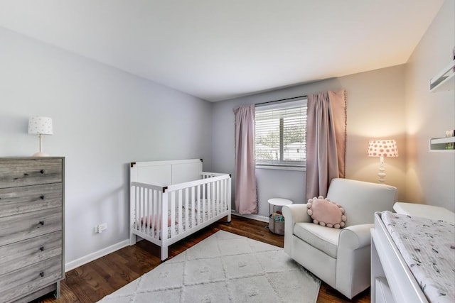 141 S Cedar St, Palatine, IL 60067 - bedroom featuring wood finished floors and a nursery area