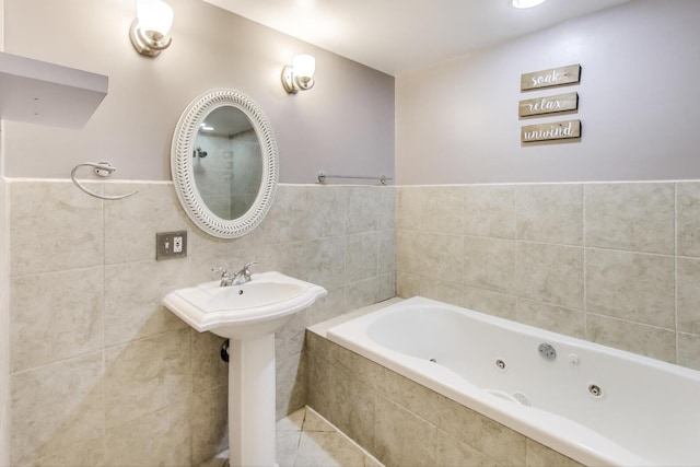 141 S Cedar St, Palatine, IL 60067 - bathroom with a tub with jets, tile walls, and a wainscoted wall