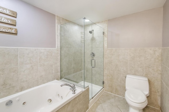 141 S Cedar St, Palatine, IL 60067 - full bathroom featuring tile walls, a jetted tub, a stall shower, and tile patterned flooring