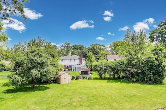 141 S Cedar St, Palatine, IL 60067 - view of yard with a shed and view of wooded area
