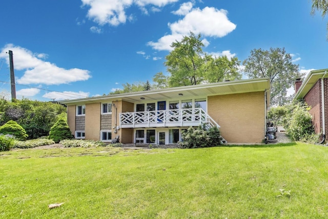141 S Cedar St, Palatine, IL 60067 - back of house with a yard and a balcony
