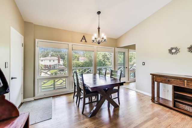 141 S Cedar St, Palatine, IL 60067 - dining area with a chandelier, light wood-type flooring, and lofted ceiling