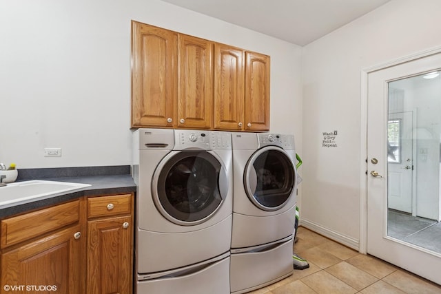 26 Red Hawk Dr, Oswego, IL 60543 - washroom featuring cabinet space, washer and clothes dryer, and light tile patterned floors