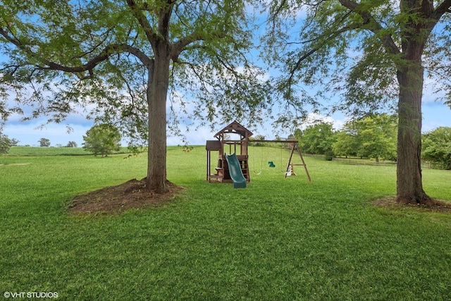 26 Red Hawk Dr, Oswego, IL 60543 - view of green lawn featuring a playground