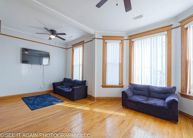 5942 S Calumet Ave, Chicago, IL 60637 - living area with a ceiling fan, hardwood / wood-style floors, and ornamental molding