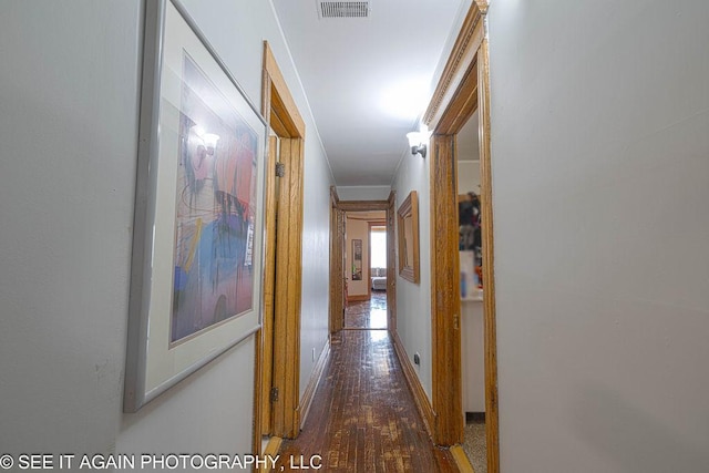5942 S Calumet Ave, Chicago, IL 60637 - corridor featuring wood finished floors and crown molding