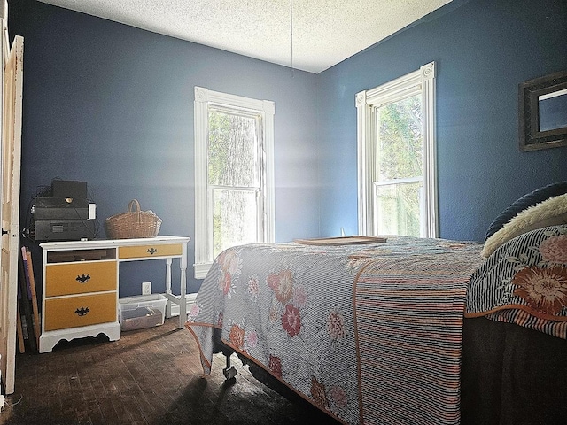 611 S Dixon Ave, Dixon, IL 61021 - bedroom with dark wood-style floors