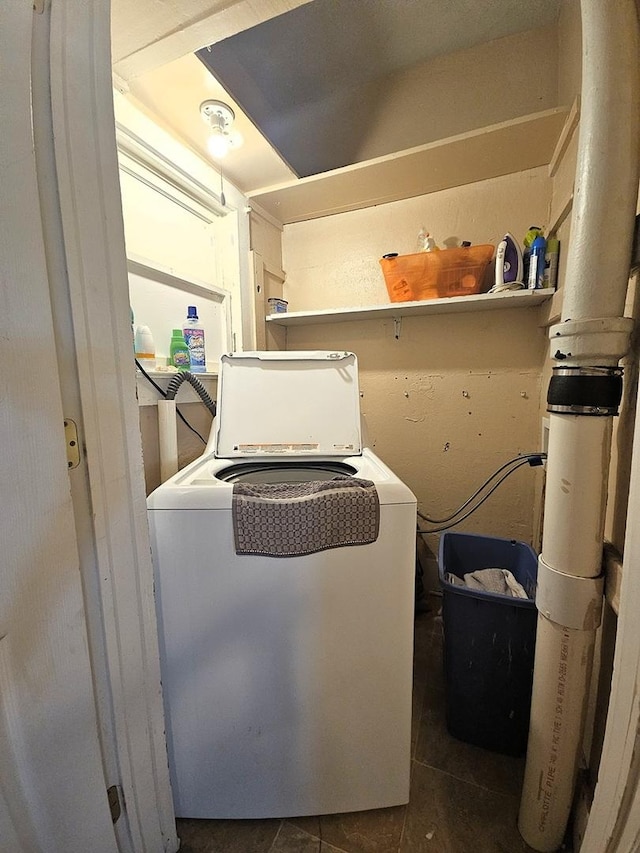 611 S Dixon Ave, Dixon, IL 61021 - laundry room with washer / clothes dryer and dark tile patterned flooring