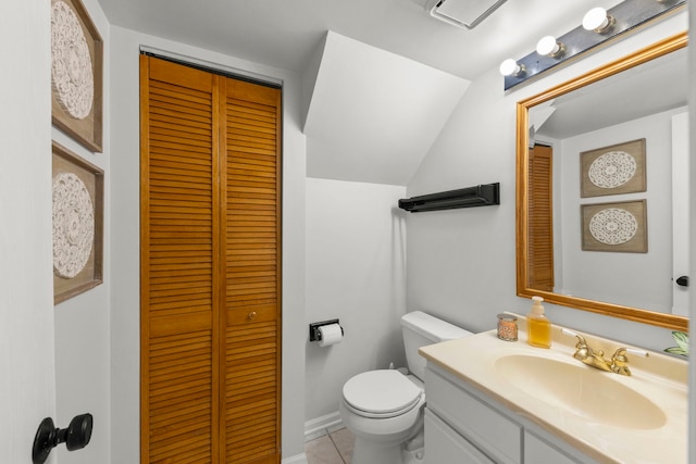 16026 85th Pl, Tinley Park, IL 60487 - bathroom with a closet, lofted ceiling, vanity, and tile patterned floors