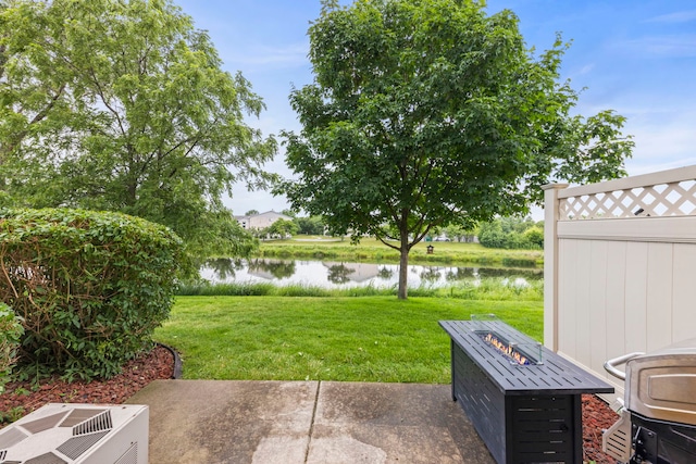 16026 85th Pl, Tinley Park, IL 60487 - view of grassy yard with a water view and a fire pit