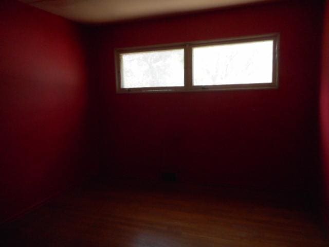 219 N Wilke Rd, Arlington Heights, IL 60005 - empty room featuring wood finished floors