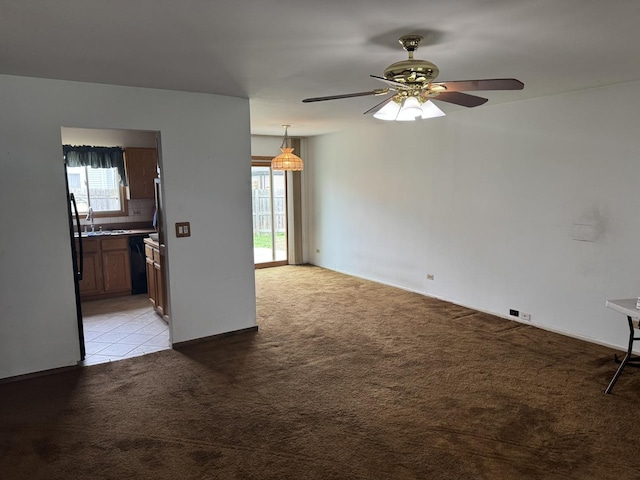 662 Berwick Pl, Roselle, IL 60172 - unfurnished living room with light carpet and a ceiling fan