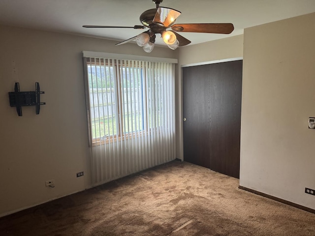 662 Berwick Pl, Roselle, IL 60172 - spare room featuring carpet and a ceiling fan