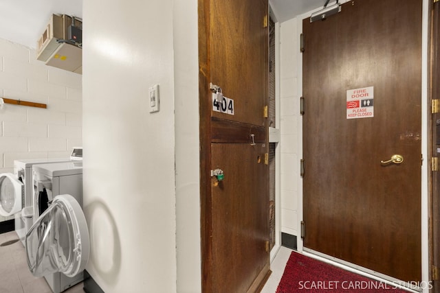 190 S Wood Dale Rd Unit 406, Wood Dale, IL 60191 - washroom with washing machine and clothes dryer