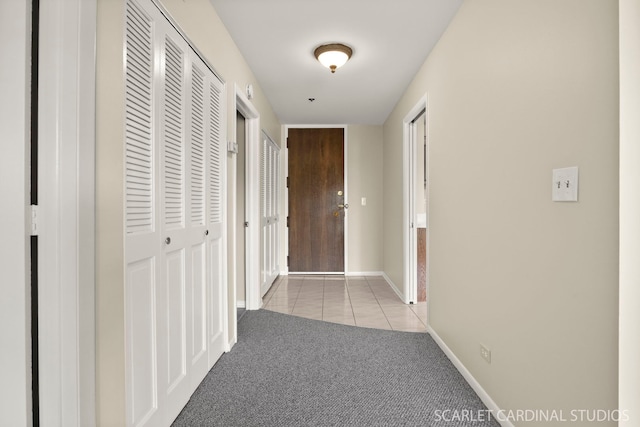 190 S Wood Dale Rd Unit 406, Wood Dale, IL 60191 - hallway with carpet flooring and tile patterned flooring