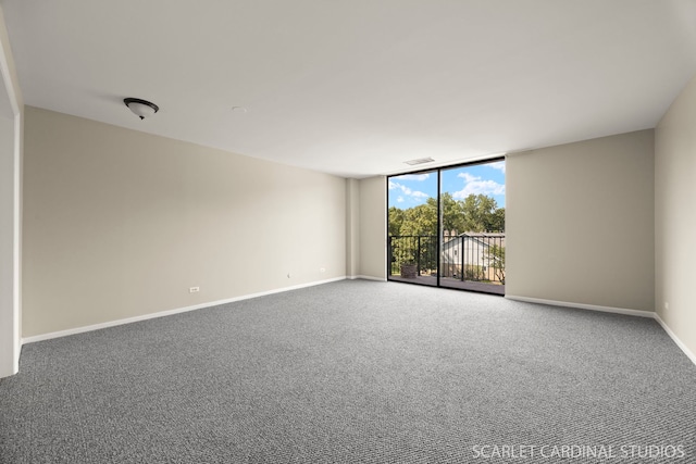 190 S Wood Dale Rd Unit 406, Wood Dale, IL 60191 - carpeted spare room with floor to ceiling windows and baseboards
