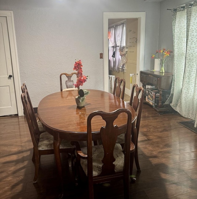 109 Seminary Ave, Aurora, IL 60505 - dining area featuring wood finished floors and a textured wall
