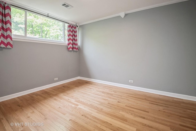 806 S May St, Chicago, IL 60607 - unfurnished room featuring ornamental molding and light wood finished floors