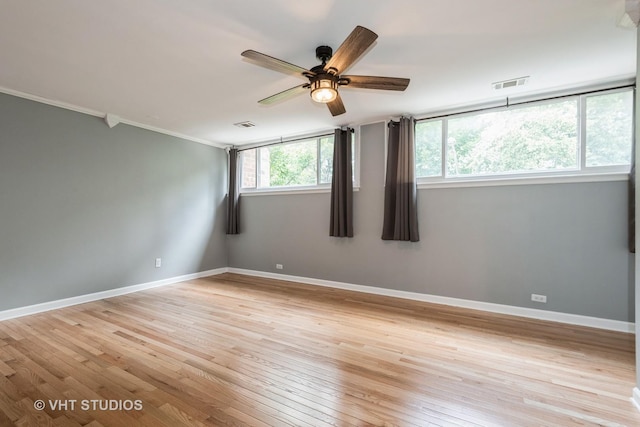 806 S May St, Chicago, IL 60607 - spare room with ornamental molding, ceiling fan, and light wood-style flooring