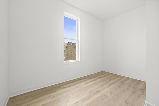 1532 S Homan Ave, Chicago, IL 60623 - empty room featuring light wood-type flooring and baseboards
