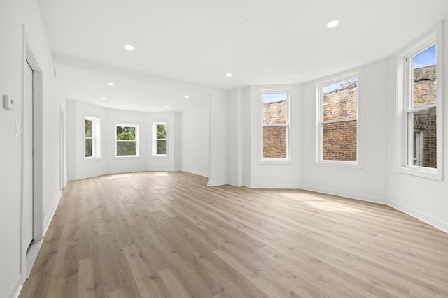 1532 S Homan Ave, Chicago, IL 60623 - unfurnished room featuring light wood-type flooring and recessed lighting