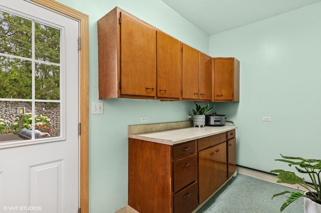 200 E Park Ave, Bloomingdale, IL 60108 - kitchen with light countertops and brown cabinetry