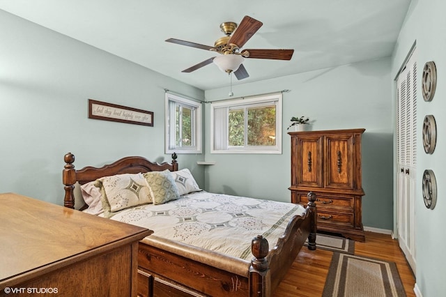 200 E Park Ave, Bloomingdale, IL 60108 - bedroom featuring a closet, dark wood-style floors, and ceiling fan