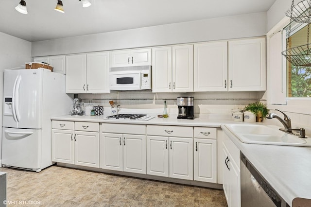 200 E Park Ave, Bloomingdale, IL 60108 - kitchen with white appliances, white cabinetry, and light countertops