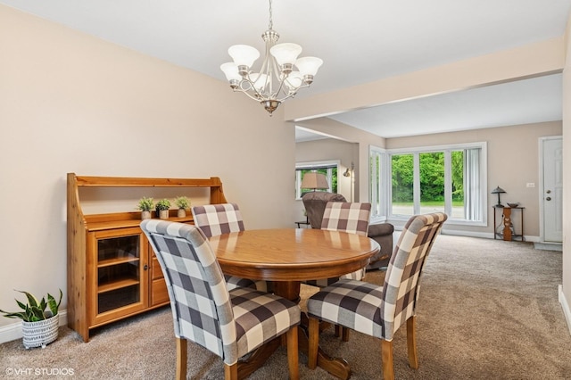200 E Park Ave, Bloomingdale, IL 60108 - dining area featuring light colored carpet and a chandelier