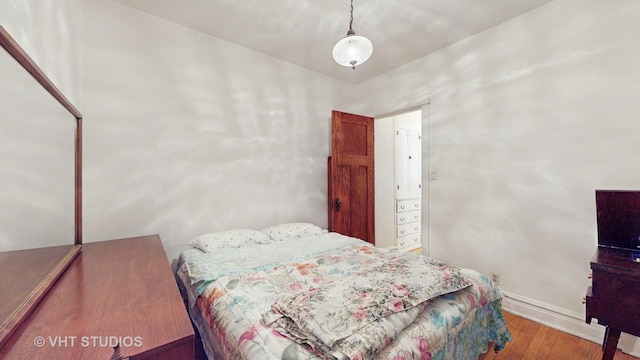 3120 N Natoma Ave, Chicago, IL 60634 - bedroom featuring wood finished floors and baseboards