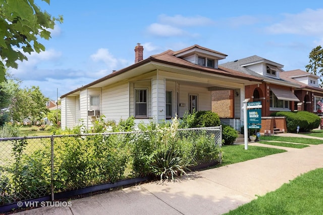 3120 N Natoma Ave, Chicago, IL 60634 - bungalow with a chimney and covered porch