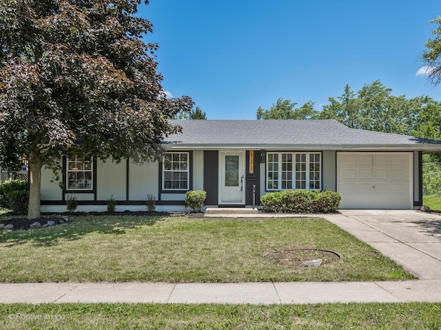 622 Pleasant Pl, Streamwood, IL 60107 - ranch-style house featuring a garage, concrete driveway, a front lawn, and a shingled roof