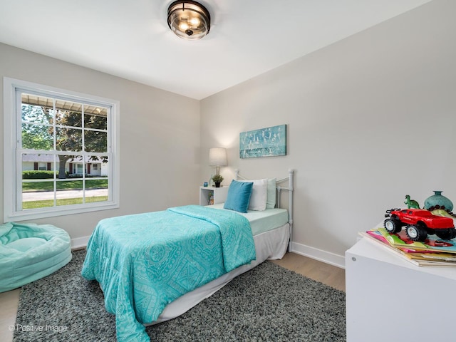 622 Pleasant Pl, Streamwood, IL 60107 - bedroom with baseboards and wood finished floors