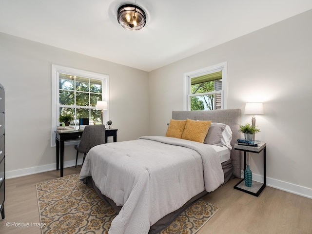 622 Pleasant Pl, Streamwood, IL 60107 - bedroom featuring light wood-style flooring and a desk