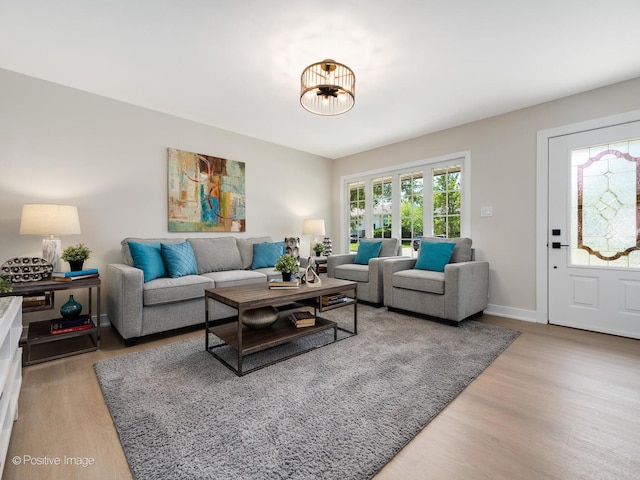 622 Pleasant Pl, Streamwood, IL 60107 - living room with wood finished floors and baseboards