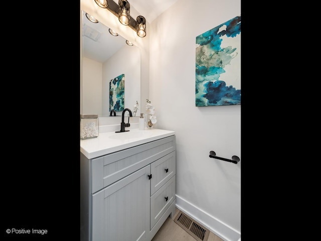 622 Pleasant Pl, Streamwood, IL 60107 - bathroom with vanity and baseboards