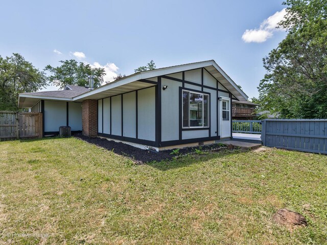 622 Pleasant Pl, Streamwood, IL 60107 - back of house featuring board and batten siding