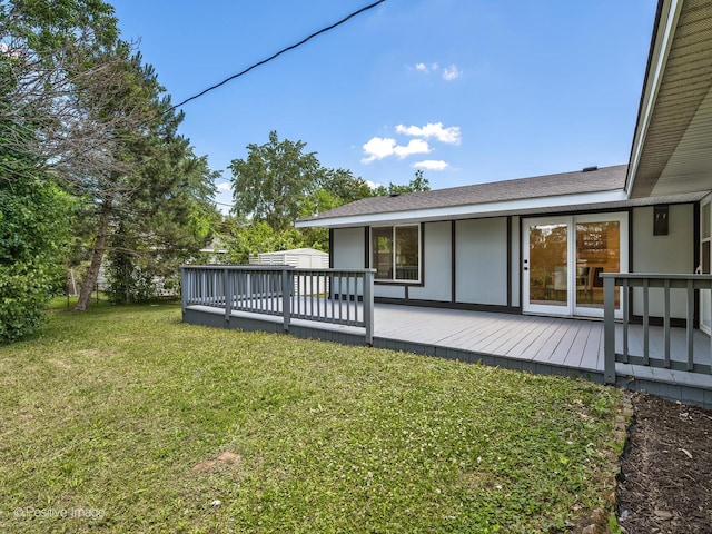 622 Pleasant Pl, Streamwood, IL 60107 - rear view of house with a wooden deck and a lawn