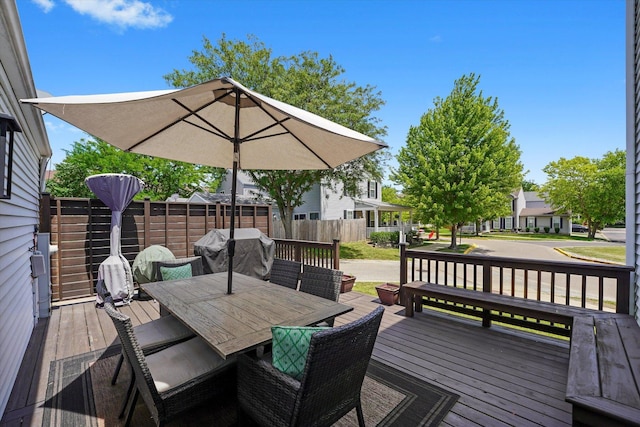 1718 Maple Park Ln, Aurora, IL 60504 - deck featuring grilling area, outdoor dining area, and a residential view