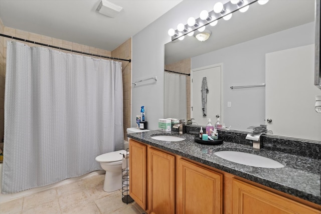 4518 S Woodlawn Ave Unit 4518, Chicago, IL 60653 - full bathroom with double vanity and tile patterned floors