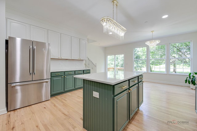 5860 Betty Gloyd Dr, Hoffman Estates, IL 60192 - kitchen with high end refrigerator, green cabinetry, white cabinetry, a chandelier, and light wood-style flooring