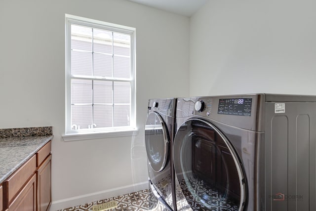 5860 Betty Gloyd Dr, Hoffman Estates, IL 60192 - laundry area with washing machine and clothes dryer, cabinet space, and tile patterned floors